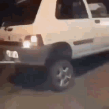 Bouncy White Car Drive GIF