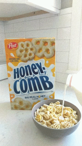 Bowl of Honeycomb Cereal Next to Box