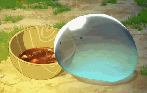 Bowl of Soup Next to Clear Ball With Face