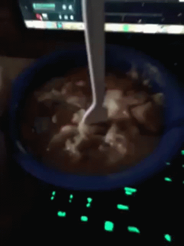 Bowl of Soup with Spoon