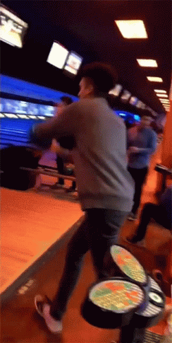 Embarrassed Man Slide Fail Bowling Alley GIF