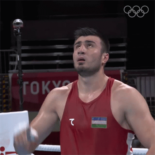 Boxer in Red Tank Top T Tokyo Sign
