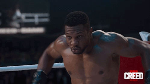 Boxers Fighting in Creed Ring