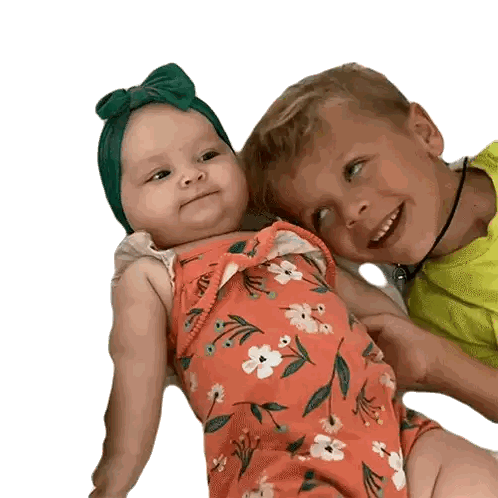 Boy and Baby Lying Side by Side