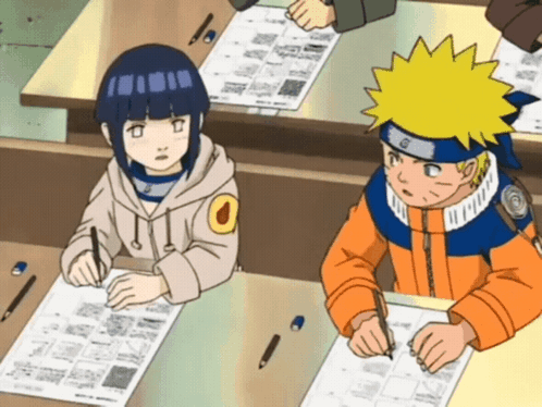 Boy And Girl At Table With Papers And Pencils GIF