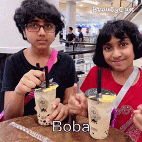 Boy And Girl Drinking Boba GIF