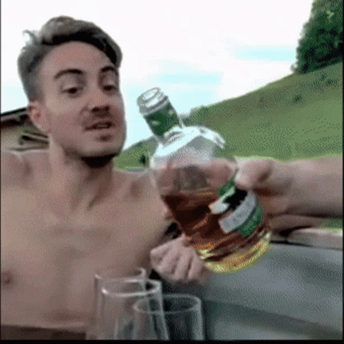 Boy And Girl Drinking Whiskey GIF