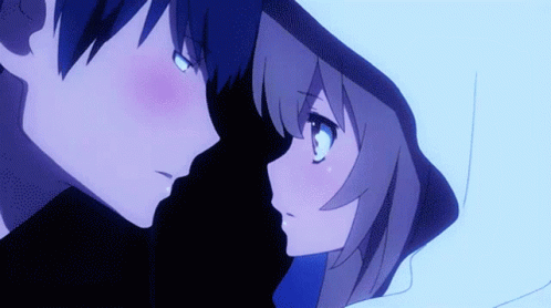 Boy and Girl Looking at Each Other in Darkness