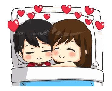 Boy and Girl Lying in Bed with Hearts