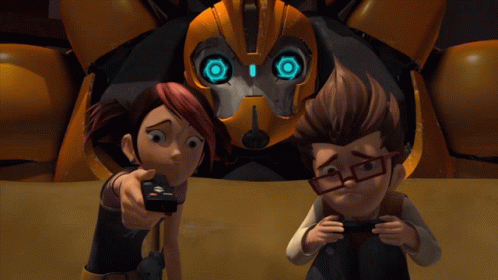 Boy and Girl Playing Video Game With Robot