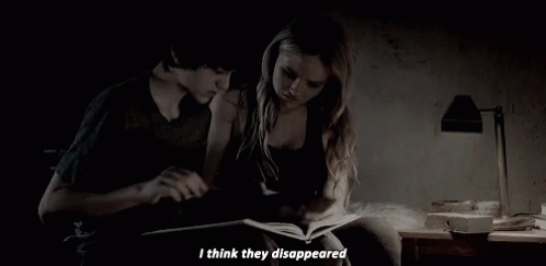 Boy and Girl Reading Book Girl Saying They Disappeared