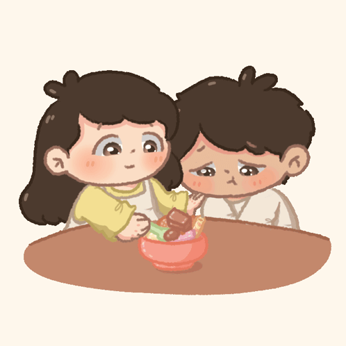 Boy and Girl Sitting at Table