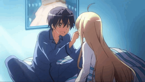 Boy And Girl Sitting On Bed GIF