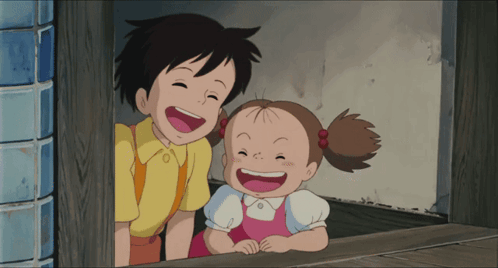 Boy and Girl Smiling From Doorway