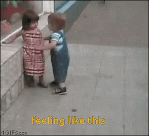 Boy And Girl Standing Sidewalk Feeling Like This GIF