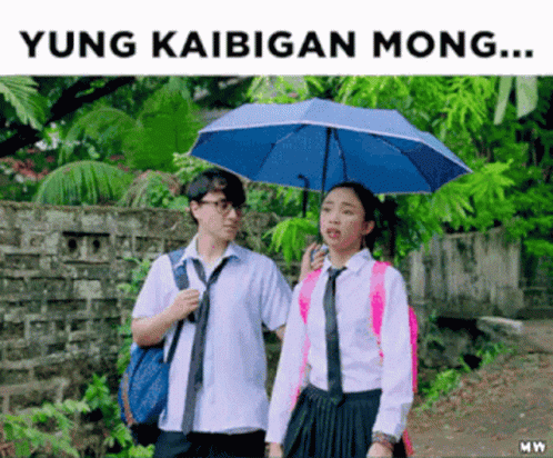 Boy and Girl Walking Under Umbrella Yung Kaibigan Mong