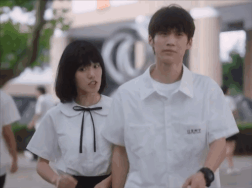 Boy and Girl with Shirt Saying LRMZ