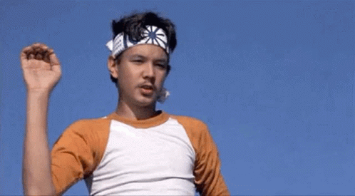 Boy And Man In Karate Uniforms Talking GIF