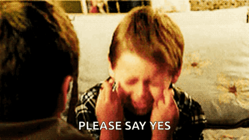 Boy Covering Face While Man Asks Please Say Yes GIF