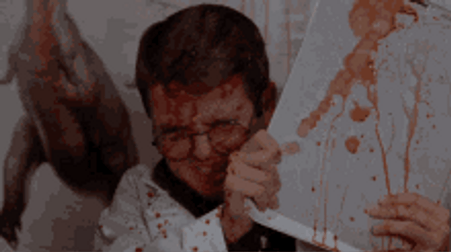 Boy Covering Himself From Blood GIF