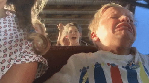 Boy Crying on Roller Coaster
