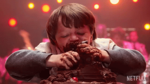Boy Eating Chocolate Cake