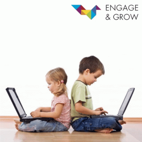 Boy Girl Back to Back Laptops Engage Grow