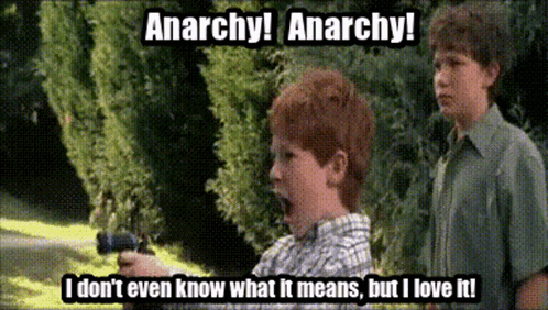Boy Holding Gun with Anarchy