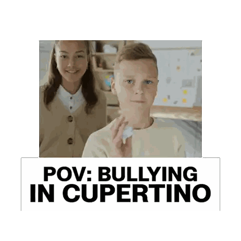 Boy Holding Paper Next to Girl