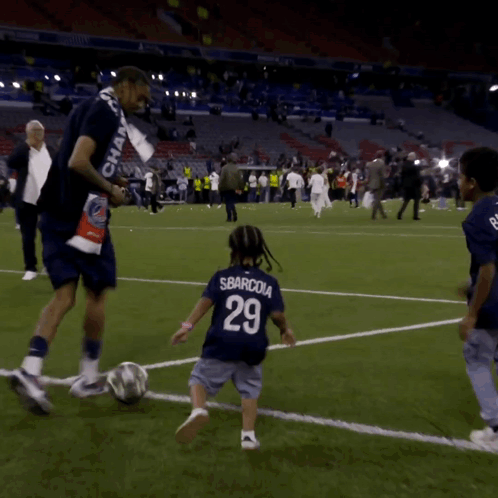 Boy in 29 Shirt Runs on Soccer Field