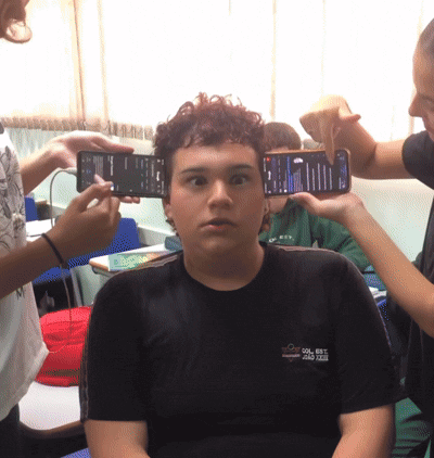 Boy in Black Shirt 'Col Est' Being Photographed