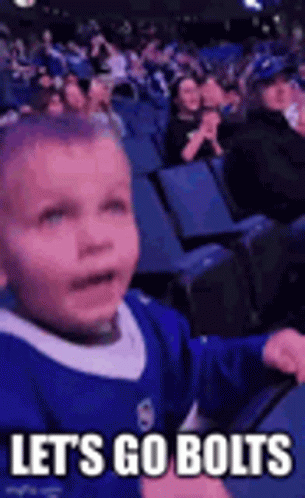 Boy In Blue Jersey Sitting In Stadium GIF