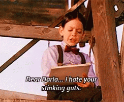 Boy in Bow Tie Reading Dear Darla I Hate Your Stinking Guts