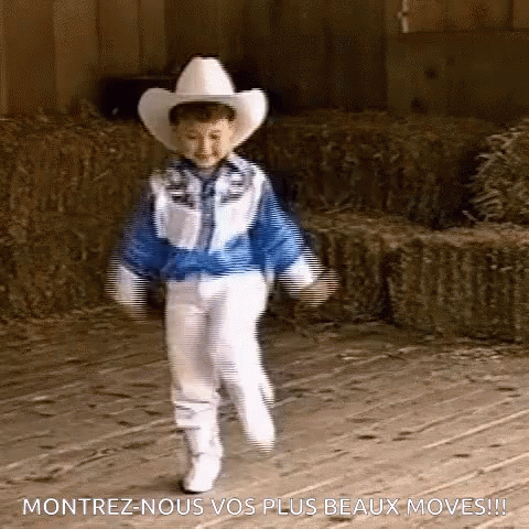 Boy in Cowboy Hat and Blue Jacket