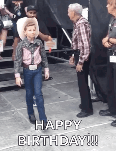 Boy In Cowboy Outfit Walking On Stage GIF