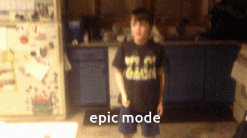 Boy in Epic Mode Shirt in Kitchen