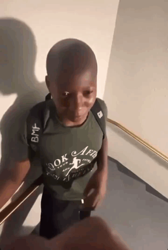Boy In Green Shirt Saying Look Aed GIF