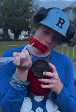 Boy In Hat With Letter R GIF