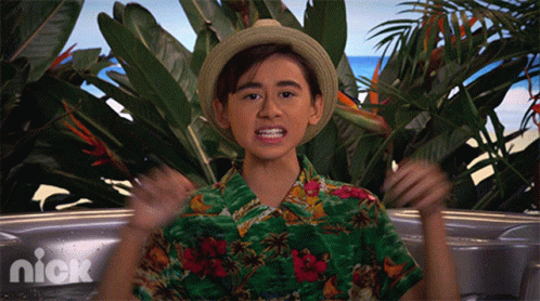 Boy in Hawaiian Shirt Sitting in Hot Tub With Nick Logo