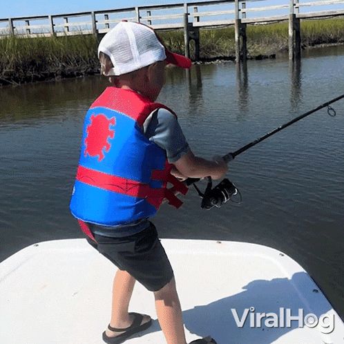 Boy in Life Vest Fishing