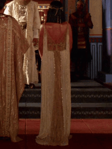 Boy in Pharaoh Costume With Flaming Torches