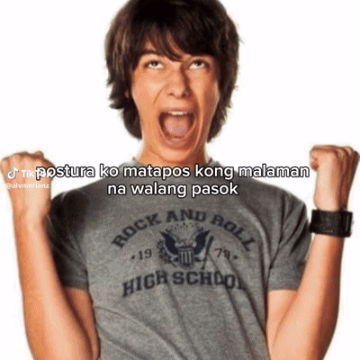 Boy in Rock and Roll High School Shirt