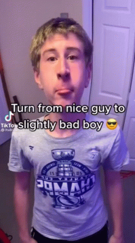 Boy in Shirt Saying Turn From Nice Guy to Slightly Bad Boy