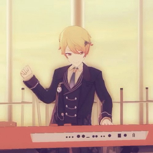 Boy in Suit Playing Keyboard