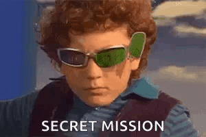Boy in Sunglasses and Vest Secret Mission