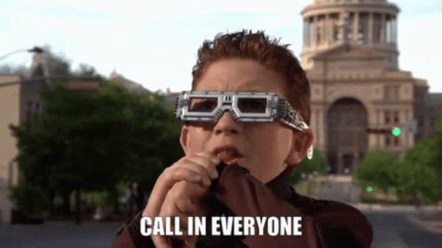 Boy in Sunglasses Saying Call In Everyone