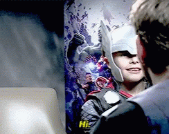 Boy in Superhero Costume Says Hi