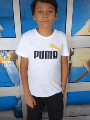 Boy in White Puma Shirt