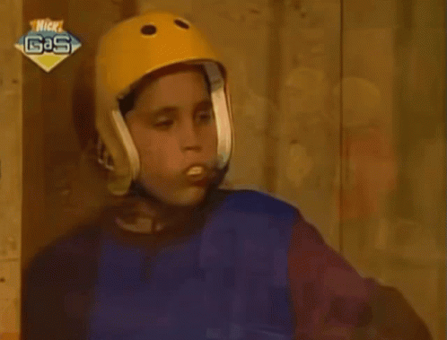 Boy in Yellow Helmet With Nickelodeon Gas Logo