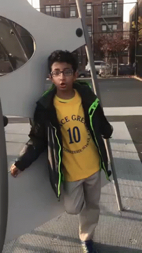 Boy In Yellow Shirt Number 10 GIF
